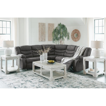 Partymate sectional — slate faux leather upholstery detail