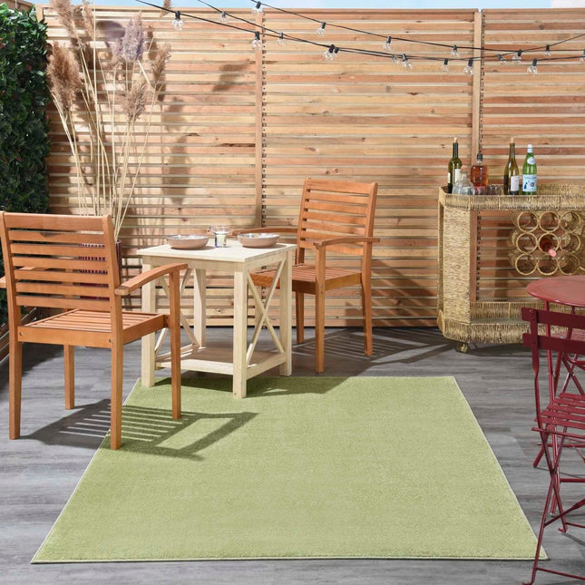 Nourison Essentials 5 ft. x 7 ft. Green Solid Contemporary Indoor/Outdoor Patio Area Rug