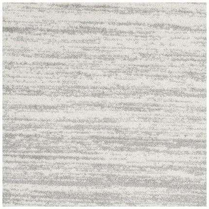 SAFAVIEH Adirondack Ivory/Silver 8 ft. x 8 ft. Round Solid Area Rug