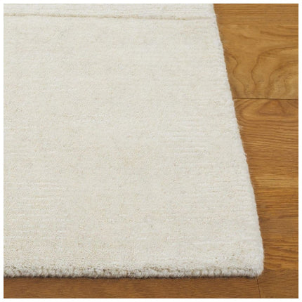 SAFAVIEH Mykonos 2 ft. x 8 ft. Ivory Geometric Solid Runner Rug
